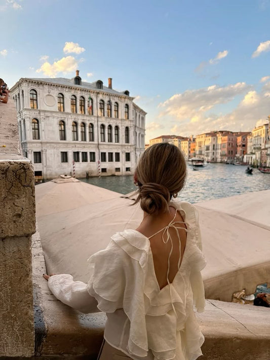 “Step into summer with bold, breezy couture by VOGUE & VIBES.”